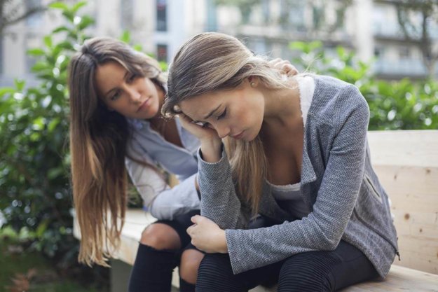 how-to-help-someone-with-depression, woman comforting a sad woman