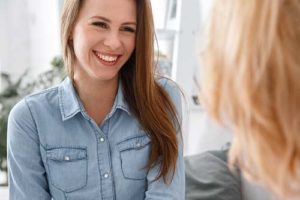 Woman smiles because of tms therapy near Riverview,FL.