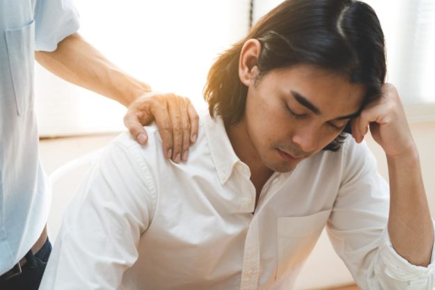 5 Common Signs of Co-Occurring Disorders in Loved Ones man struggling with co-occurring disorders