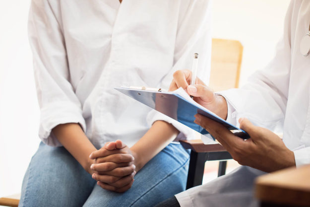 doctor talking to patient